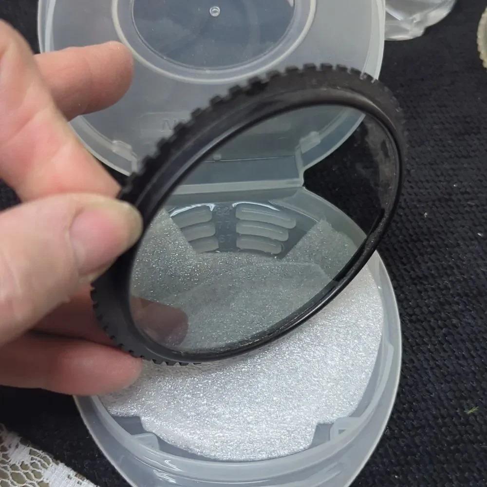 collection‎ of camera lens filters, likely used for photography